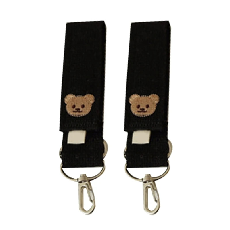 attache poussette pour sac a langer
