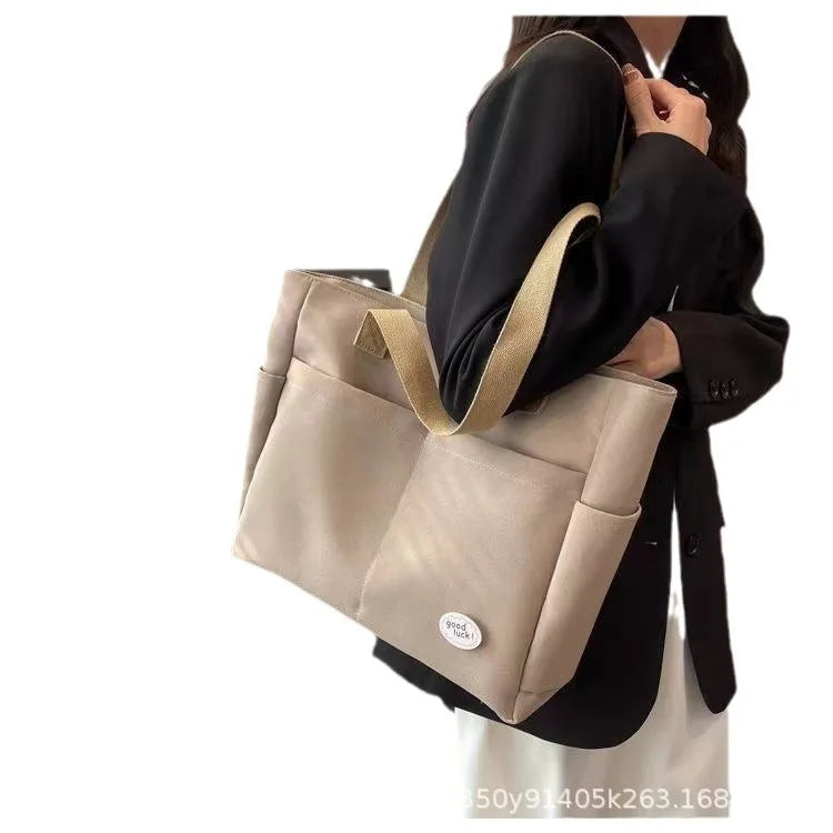 sac a langer beige et noir