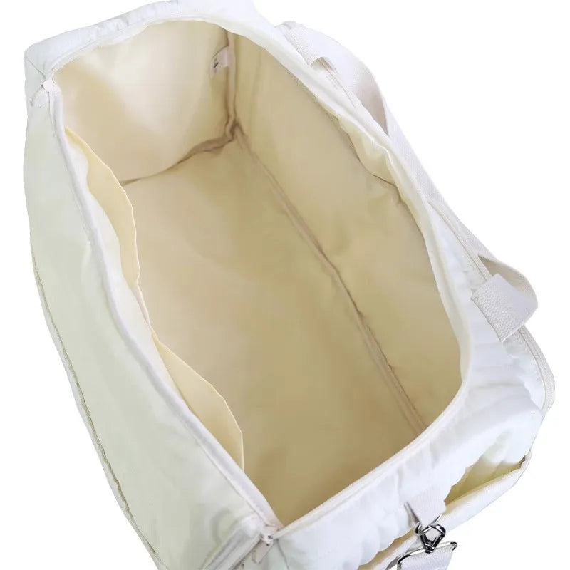 sac à langer blanc