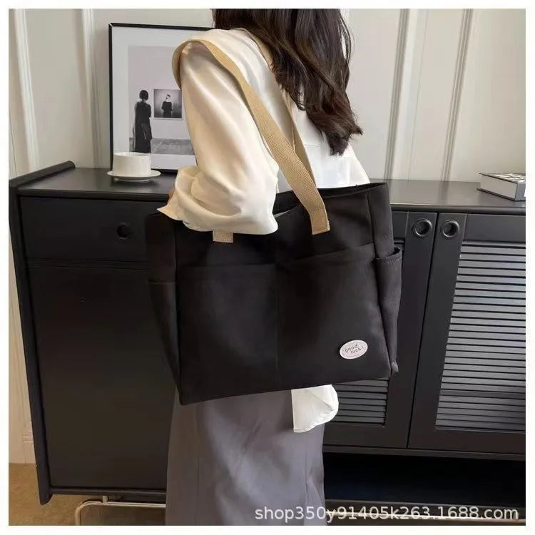 sac a langer beige et noir