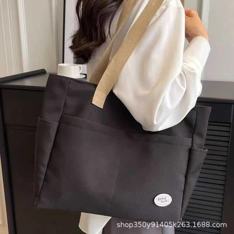 sac a langer beige et noir