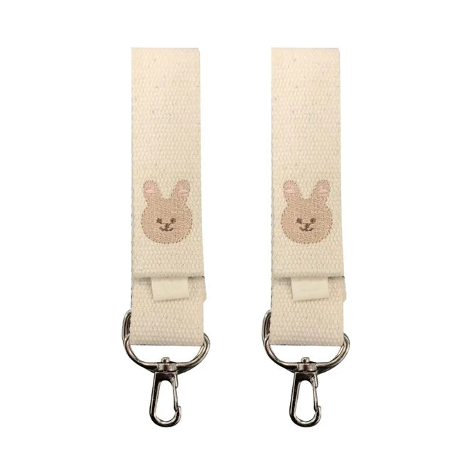 attache poussette pour sac a langer