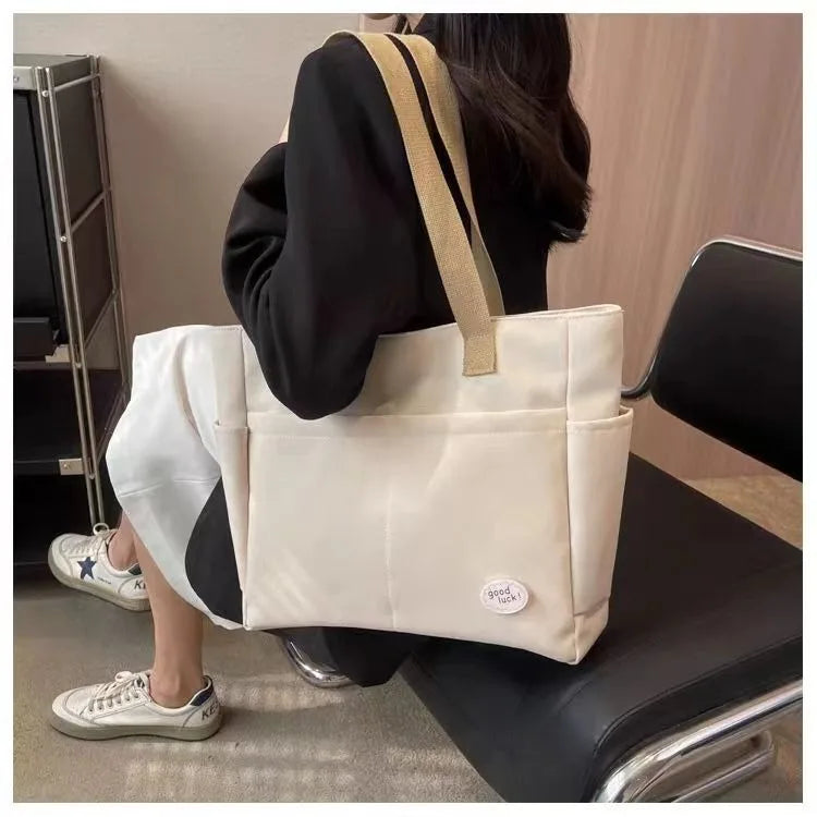 sac a langer beige et noir