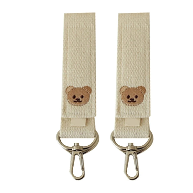 attache poussette pour sac a langer
