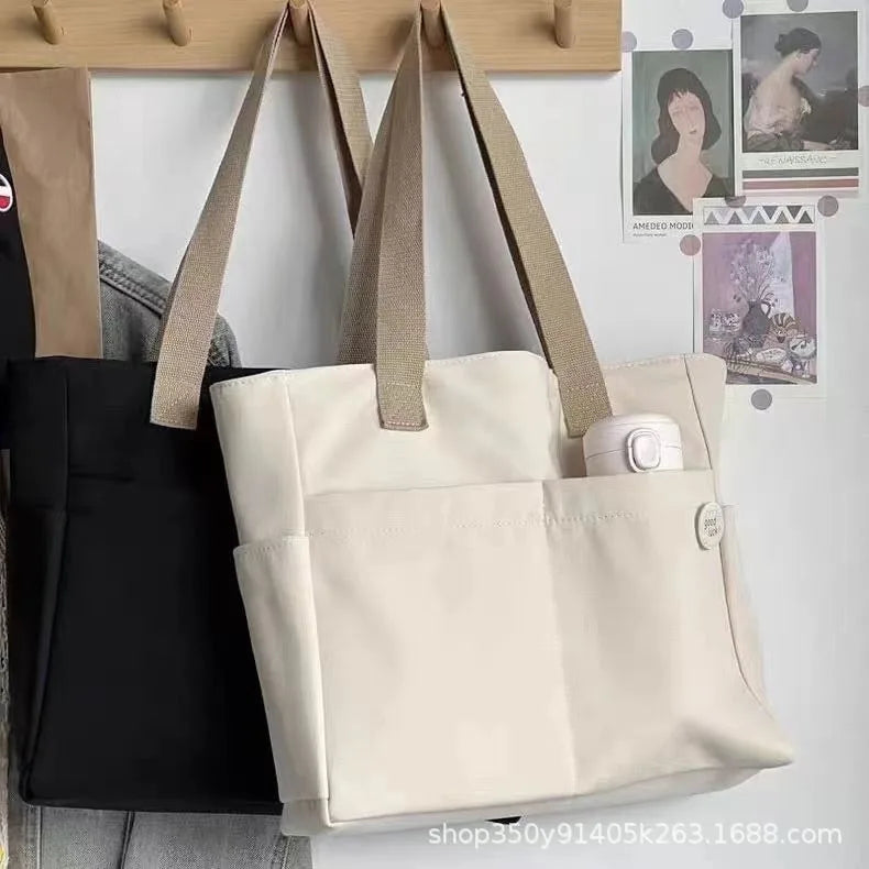 sac a langer beige et noir