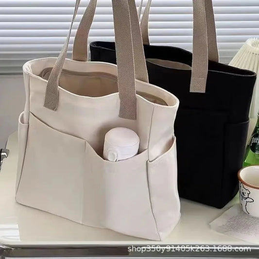 sac a langer beige et noir